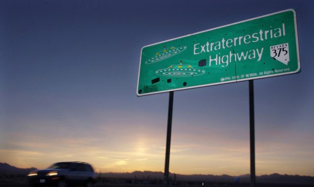 FILE - In this April 10, 2002, file photo, a vehicle moves along the Extraterrestrial Highway near ...