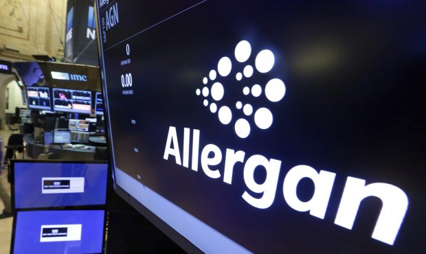 FILE - In this Monday, Nov. 23, 2015, file photo, the Allergan logo appears above a trading post on...