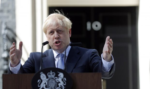 Britain's new Prime Minister Boris Johnson gestures as he speaks outside 10 Downing Street, London,...