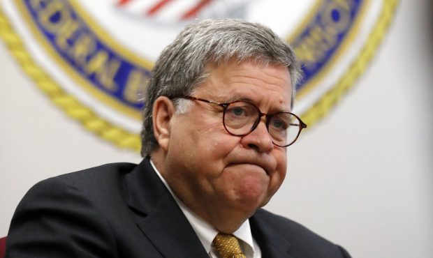 FILE - In this July 8, 2019 file photo, Attorney General William Barr speaks during a tour of a fed...