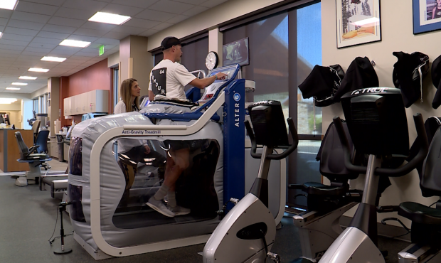 Brian Tolbert walks on an antigravity treadmill which reduces his body weight and also the impact o...
