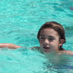 Seven-year-old Archer Rugh nearly drowned two years ago in the neighborhood pool.