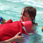 Intermountain Healthcare's Marilyn Morris encourages parents to put their kids in U.S. Coast Guard approved life vests.