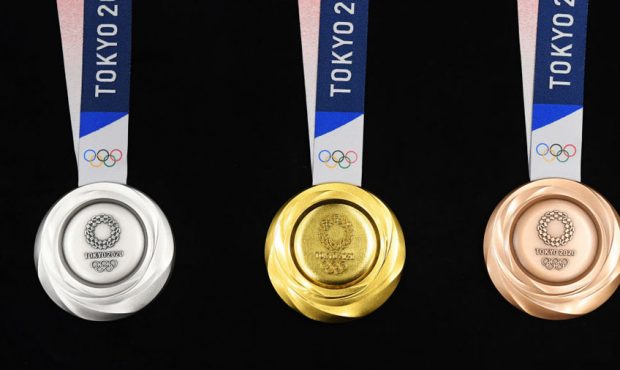 The silver, gold and bronze medals are displayed after the Tokyo 2020 medal design unveiling ceremo...