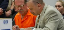 Ron Lafferty, left, and defense attorney Ron Yengich review legal documents in 4th District Court in Provo on Sept. 25, 2002. (Photo: Stuart Johnson, Deseret News)