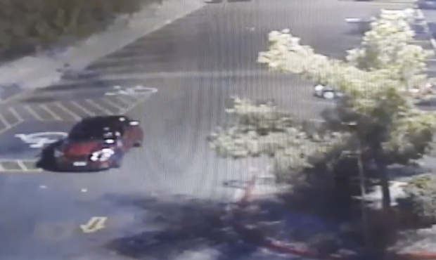 Layton City Police are searching for the red car from this surveillance footage. They believe the d...