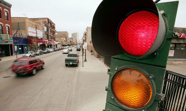 FILE: CHICAGO - APRIL 20:  A traffic light controls the flow of vehicles and pedestrians April 20, ...