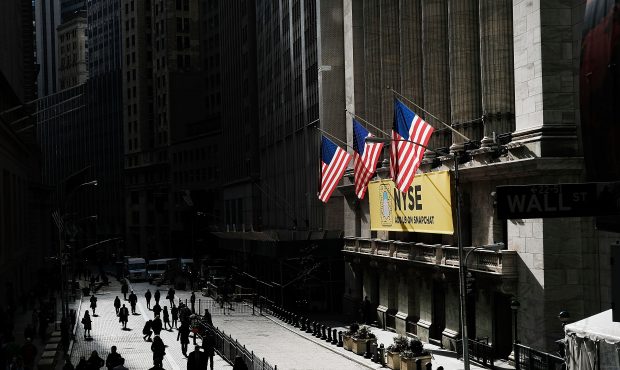 NEW YORK, NY - JANUARY 25:  Pedestrians walk outside of the New York Stock Exchange (NYSE) after th...