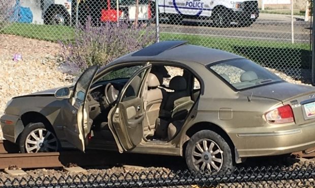 A car was hit by a TRAX train on Monday morning, Aug. 26, 2019, near the Murray Central Station. Ph...