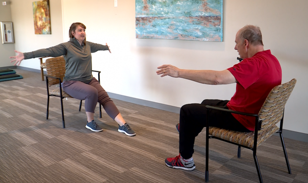 Sixty-year-old Mike Jorgensen does physical therapy with Intermountain Healthcare's Allison Merrell...