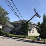 A dump truck snagged communications lines and knocked down at least 8 power poles, according to officials. (Image courtesy Provo Power/Twitter)