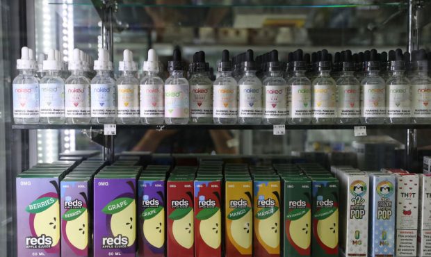 E-juice, used in e-cigarette vaporizers, is displayed at Smoke and Gift Shop on June 25, 2019 in Sa...
