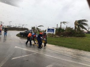 In this USCG handout image, Guard personnel help medevac a patient in the Bahamas during Hurricane Dorian on September 3, 2019. The massive, slow-moving hurricane which devastated parts of the Bahamas with 110 mph winds and heavy rains is expected to now head northwest and travel parallel to Florida’s eastern coast, according to the National Weather Service. The Coast Guard is supporting the Bahamian National Emergency Management Agency and the Royal Bahamian Defense Force with hurricane response efforts. (Photo by Coast Guard Air Station Clearwater via Getty Images).
