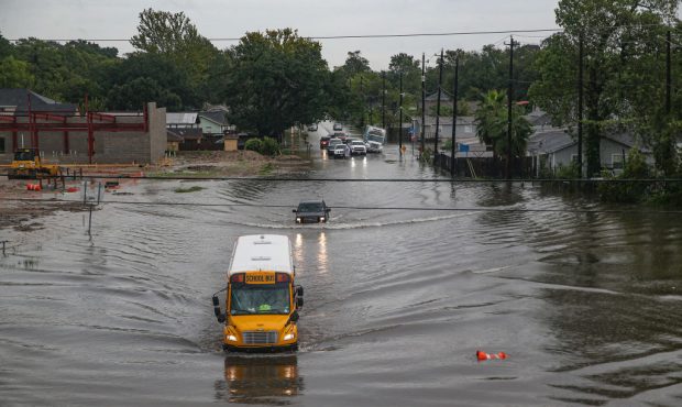 A school bus makes its way on the flooded Hopper Rd. on September 19, 2019 in Houston, Texas. Gov. ...