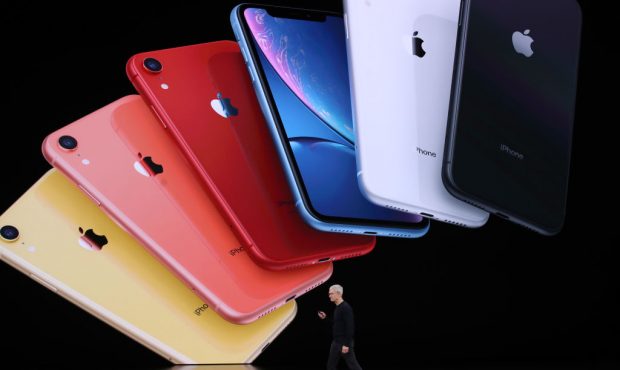Apple CEO Tim Cook announces the new iPhone 11 as he delivers the keynote address during a special ...