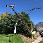 A dump truck snagged communications lines and knocked down at least 8 power poles, according to officials. (Image courtesy Provo Power/Twitter)