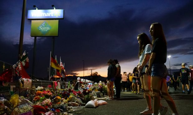 EL PASO, TX - AUGUST 15:  People gather at a makeshift memorial honoring victims outside Walmart Au...