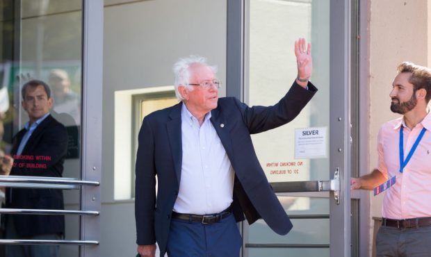Democratic presidential candidate, Sen. Bernie Sanders (I-VT) waves as he walks towards the stage d...