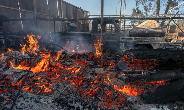 SAN BERNARDINO, CA - OCTOBER 31: The ruins of a sables area smolder at the 46 Fire on October 31, 2...