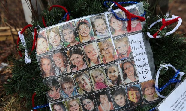 Photos of Sandy Hook Elementary School massacre victims sits at a small memorial near the school on...