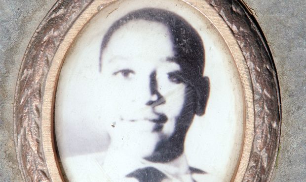 FILE: A photo of Emmett Till is included on the plaque that marks his gravesite at Burr Oak Cemeter...