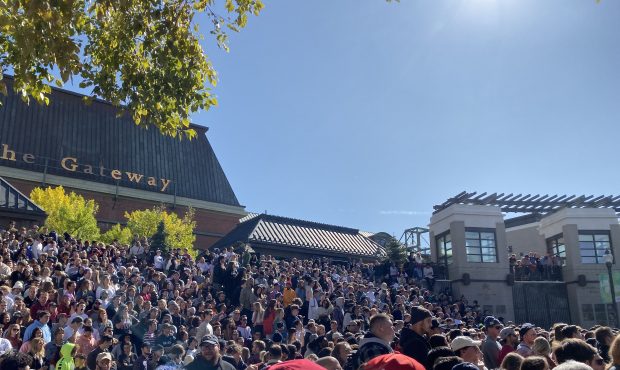 A crowd gathers at The Gateway in Salt Lake City to watch Kanye West's "Sunday Service"...