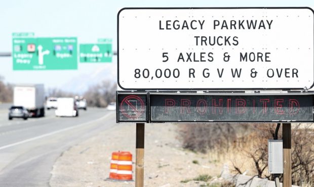 Signs on northbound I-215 warn that no trucks are allowed on Legacy Parkway on Wednesday, March 20,...