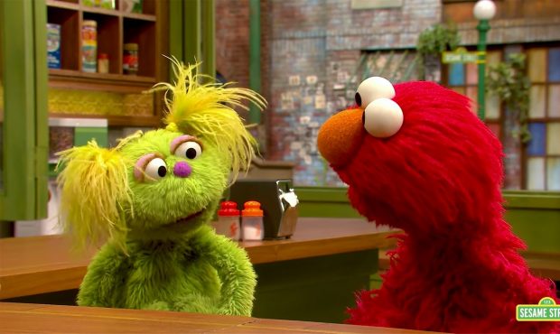 Karli, left, talks to her friend Elmo about her mom going to meetings to help her recover from addi...