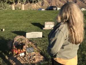 Wendy Harmon visits the gravesite of her son, Reo Watts. Watts was killed in the Utah State Prison in September 2019.