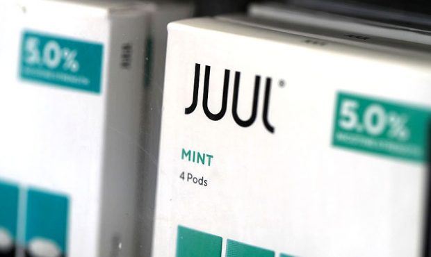 Packages of Juul mint flavored e-cigarettes are displayed at San Rafael Smokeshop on November 07, 2...