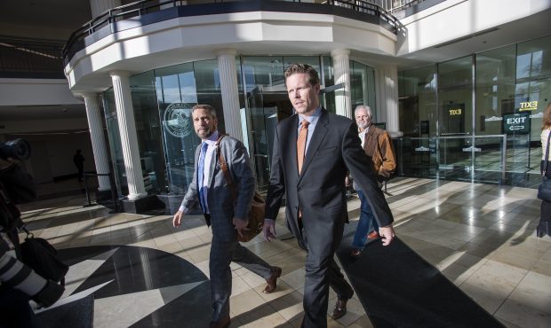 Paul Petersen, right, leaves the Matheson Courthouse in Salt Lake City with his attorney, Scott Wil...
