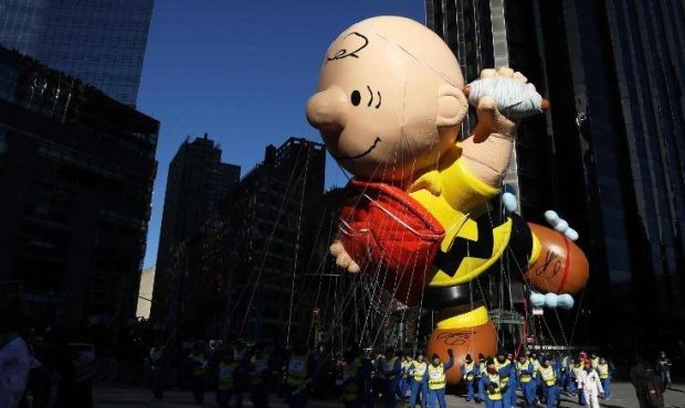 A giant Charlie Brown balloon hovers above the crowd during the Macy's Thanksgiving Day Parade in N...