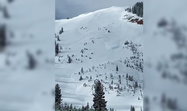 A snowboarder narrowly outran an avalanche triggered on Christmas Day in the same area where a slid...