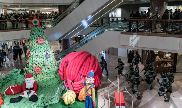 HONG KONG, CHINA - DECEMBER 24: Riot police secure an area in shopping mall on December 24, 2019 in...