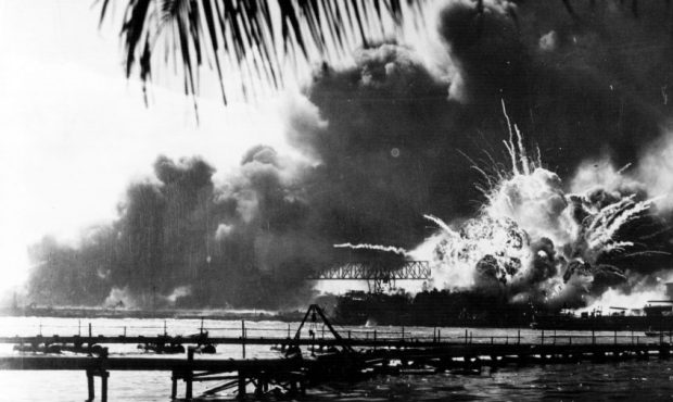 The American destroyer USS Shaw explodes during the Japanese attack on Pearl Harbour (Pearl Harbor)...