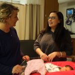 Stephanie Lloyd talks with nurse Michele Carnesecca about breastfeeding.