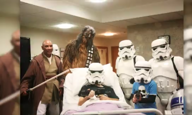 A "Star Wars" fan in hospice care got his dying wish to see the new movie before it is released in ...