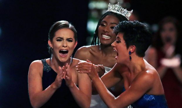 Camille Schrier, of Virginia, left, reacts after winning the Miss America competition at the Mohega...