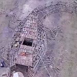 Josh Weidert, 33, and his group of friends have been building Christmas Eve bonfires in Garyville, LA, for about 20 years now. This year they built a 78-foot alligator bonfire from raw lumber on the Mississippi River levee.  (Josh Weidert)