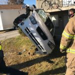 One person was arrested following a crash that left a vehicle on its side in the front yard of a Provo apartment complex on Dec. 23, 2019. (Photo: Utah County Sheriff's Office)