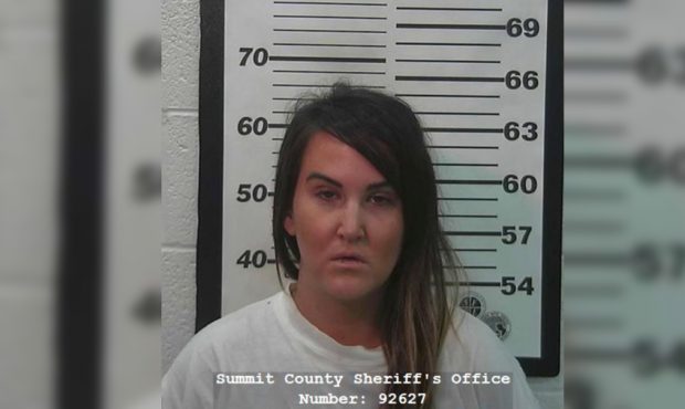 Ashley Morgan was booked into jail on charges of child abuse and witness tampering. (Summit County ...