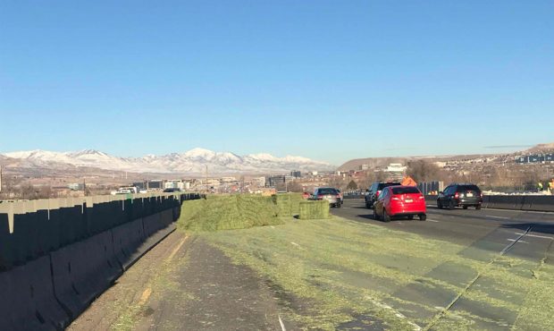 A trailer overturned on northbound I-15 in Lehi Tuesday morning, spilling hay bales across multiple...