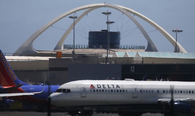 FILE: A Delta plane taxis at Los Angeles International Airport on July 12, 2018, in Los Angeles, Ca...