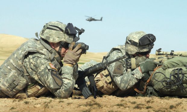 U.S. Army Soldiers with Foxtrot Troop, 1st Armored Division conduct a combat patrol during an air a...