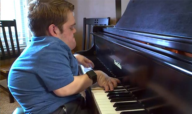 Man with dwarfism is an accomplished collegiate-level pianist and composer (Courtesy: KSL TV)...