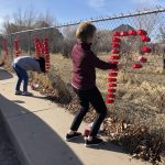 Red cups spelling out "Semper Fi" were placed in a fence along the procession route for Marine Matthew Ryan Adams. (Alex Cabrero/KSL TV)