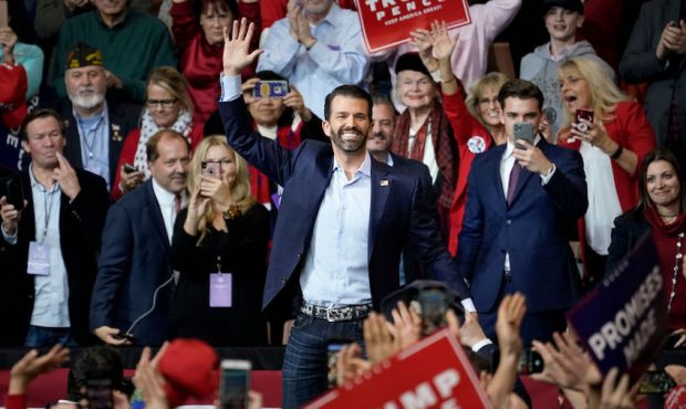 Donald Trump Jr. waves to the crowd before speaking during a "Keep America Great" rally at Southern...