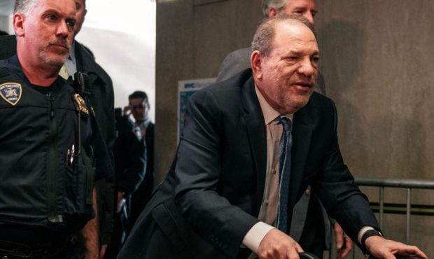 Movie producer Harvey Weinstein (R) enters New York City Criminal Court on February 24, 2020 in New...