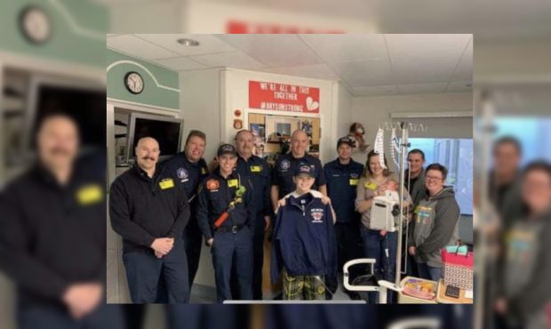 Members of SLC Fire visit 13-year-old Wyoming resident Bryson, who is awaiting a heart transplant i...