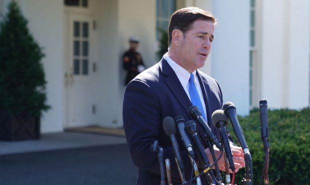 FILE: Arizona Governor Doug Ducey talks to reporters after meeting with President Donald Trump at t...